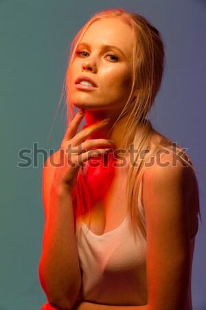 Portrait of attractive woman with blonde hair and red lips Stock photo © deandrobot