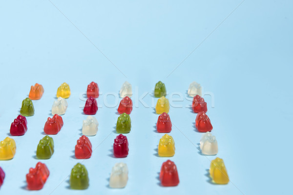 Chewing candy in teddy bear form Stock photo © deandrobot