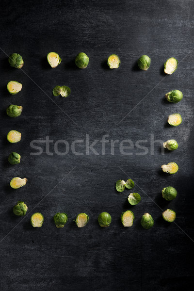 Stock photo: Brussels sprouts over dark chalkboard background