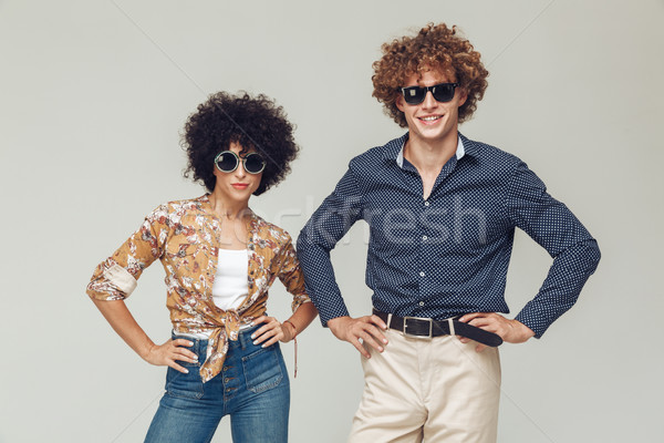 Young retro loving couple posing isolated Stock photo © deandrobot