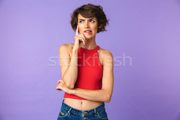 Porträt verwechselt junge Mädchen Denken isoliert violett Stock foto © deandrobot