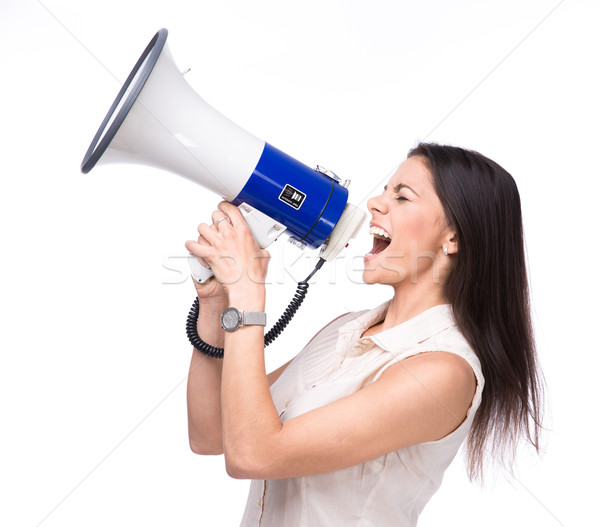 Businesswoman shouting in loudspeaker Stock photo © deandrobot