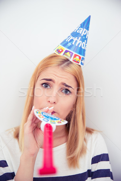 Fată petrecere pălărie fluier gri Imagine de stoc © deandrobot