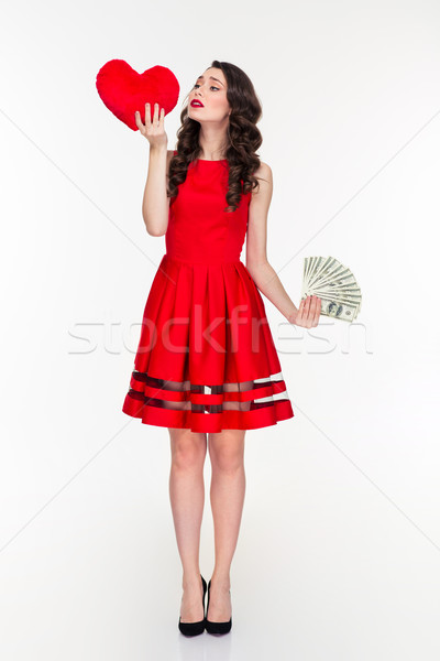 Woman choosing between love or money Stock photo © deandrobot
