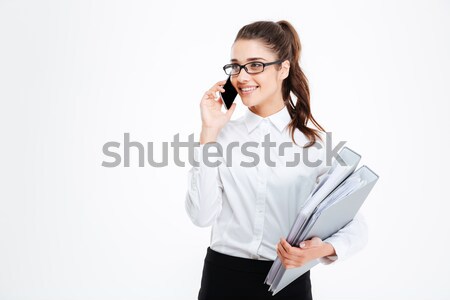 Feliz jóvenes mujer de negocios carpetas hablar Foto stock © deandrobot