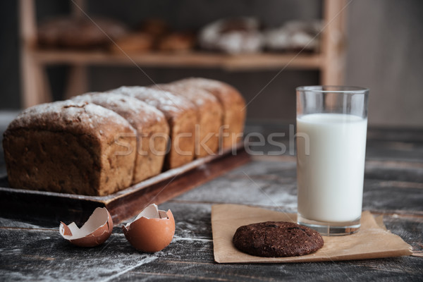 Bread with milk and cookie near eggs Stock photo © deandrobot