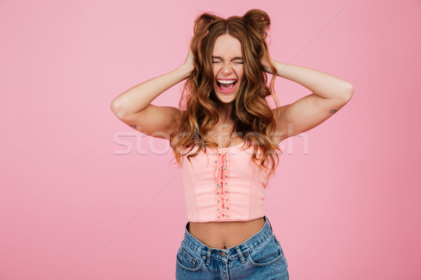 Portrait of a crazy yuong woman in summer clothes screaming Stock photo © deandrobot