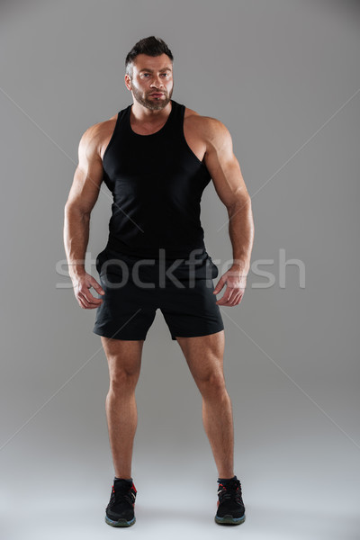 Ritratto concentrato maschio bodybuilder piedi Foto d'archivio © deandrobot