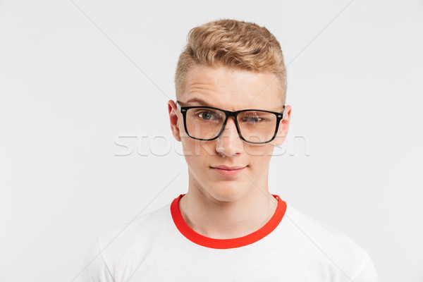 Image closeup of blond teenage guy having clean healthy skin wea Stock photo © deandrobot