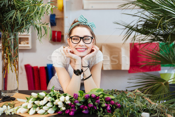 Alegre mulher florista tulipas Foto stock © deandrobot