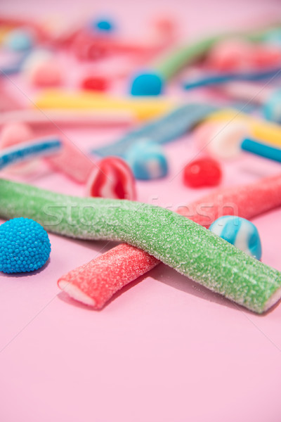 Közelkép nyami színes cukor cukorkák izolált Stock fotó © deandrobot