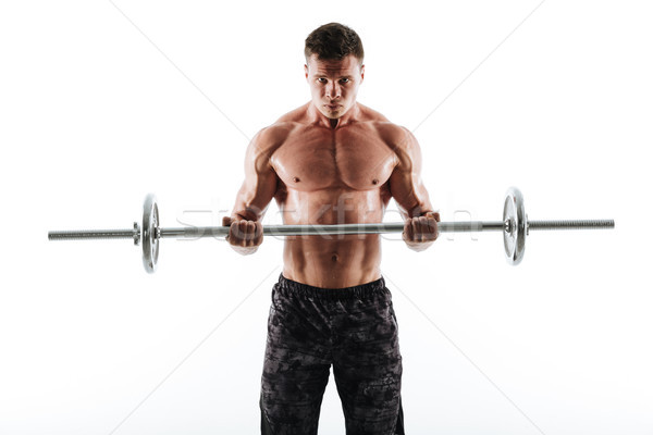 Portrait of strong sweaty sports man in black shorts exercising  Stock photo © deandrobot
