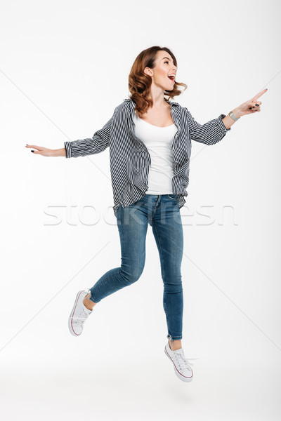 Retrato excitado casual nina saltar Foto stock © deandrobot