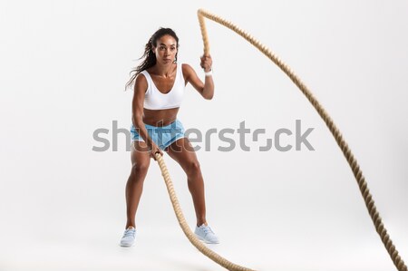 Achteraanzicht portret sexy vrouw vergadering houten stoel vrouw Stockfoto © deandrobot