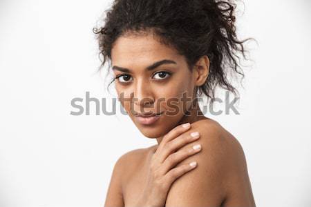Afro american woman blowing kiss at camera Stock photo © deandrobot