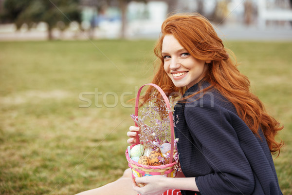 Lány hosszú haj tart húsvét piknikkosár portré Stock fotó © deandrobot
