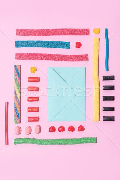 Top view of a group of tasty colorful sugar candies Stock photo © deandrobot