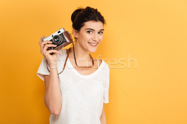 Emotional happy young pretty woman photographer Stock photo © deandrobot