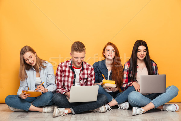 Groupe jeunes puce école amis devoirs [[stock_photo]] © deandrobot