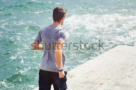 Back view portrait of sports man running  Stock photo © deandrobot