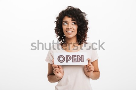 Happy female showing blank laptop computer screen and thumbs up Stock photo © deandrobot