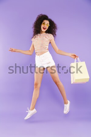 Charmant vrouw vergadering skateboard jonge vrouw geïsoleerd Stockfoto © deandrobot