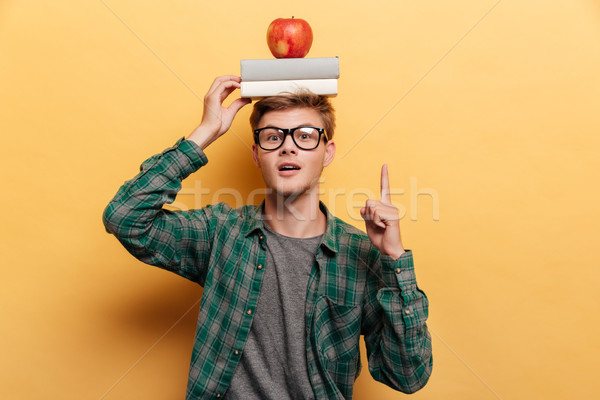 человека книга яблоко голову Идея счастливым Сток-фото © deandrobot