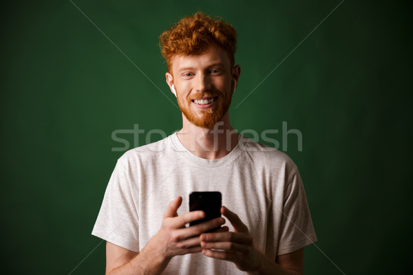 Stock foto: Porträt · jungen · lächelnd · Rotschopf · bärtigen · junger · Mann