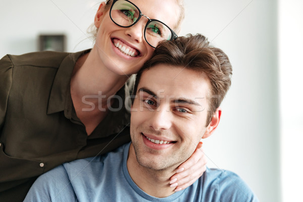 Portrait of beautiful couple looking camera Stock photo © deandrobot