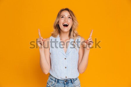 Portrait of an excited little schoolgirl with backpack Stock photo © deandrobot