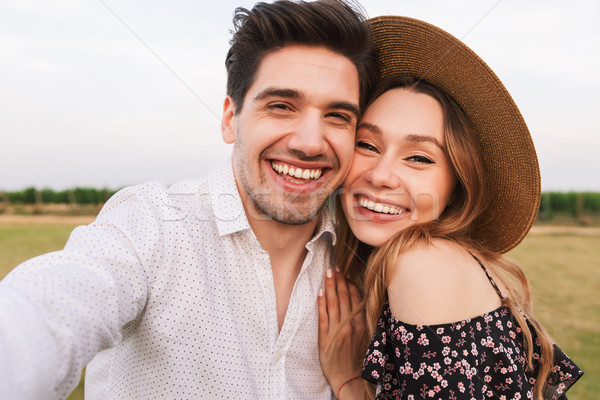 Sonriendo Pareja hombre mujer data toma Foto stock © deandrobot