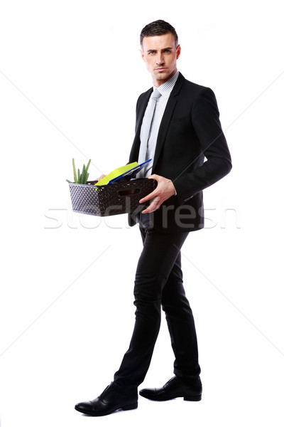 You are fired! Businessman hold box with personal belongings isolated on white background Stock photo © deandrobot