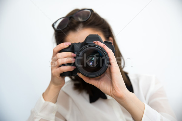 Femme photographe caméra gris technologie jeunes [[stock_photo]] © deandrobot