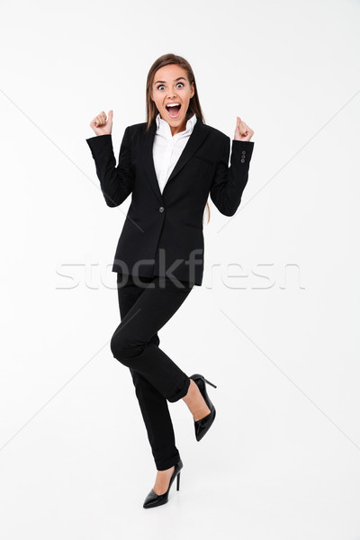 Hurlant excité femme d'affaires permanent isolé photo [[stock_photo]] © deandrobot