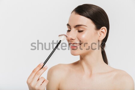 Beauty picture of adorable brunette woman looking away and smili Stock photo © deandrobot