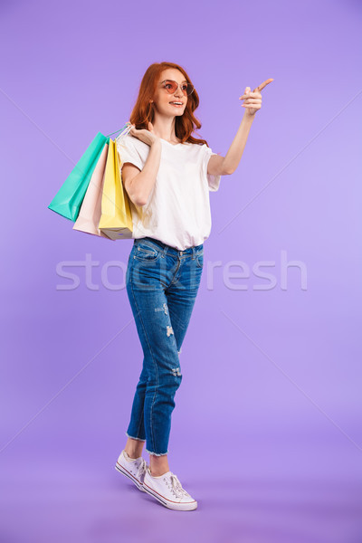 Stockfoto: Portret · glimlachend · jong · meisje · zonnebril · permanente