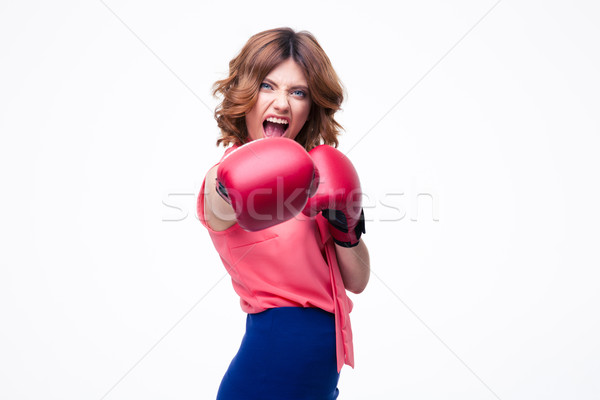 Angry elegant woman with boxing gloves fighting Stock photo © deandrobot
