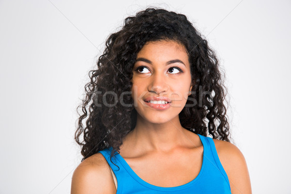 Porträt nachdenklich Frau beißen Lippen afro Stock foto © deandrobot