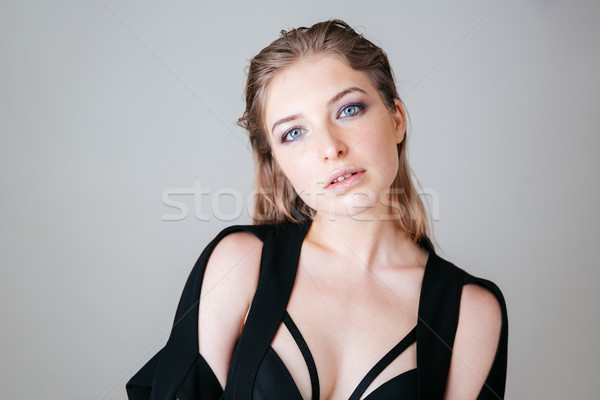 Frau schauen Kamera Porträt grau Stock foto © deandrobot