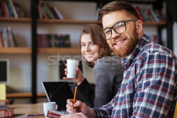 Stockfoto: Twee · gelukkig · studenten · laptop · computer · netwerken · bibliotheek