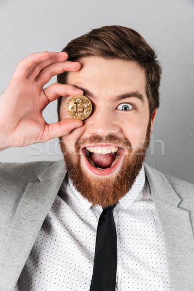 Satisfecho empresario traje bitcoin Foto stock © deandrobot