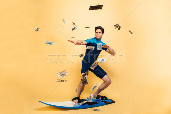 Teljes alakos portré fiatalember fürdőruha szörfözik tábla Stock fotó © deandrobot