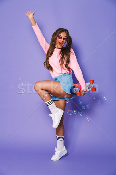Teljes alakos portré európai görkorcsolyázó lány kettő Stock fotó © deandrobot