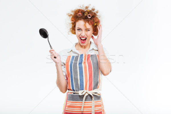 Háziasszony göndör haj kötény tart leves merőkanál Stock fotó © deandrobot