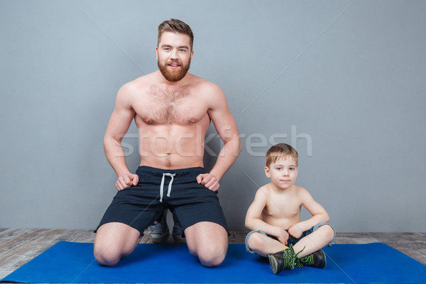 Gelukkig vader zoon vergadering Blauw yogamat Stockfoto © deandrobot