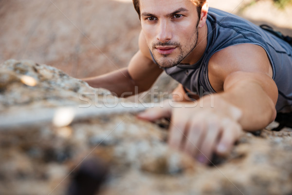 Stockfoto: Man · greep · rock · steil · klif · muur