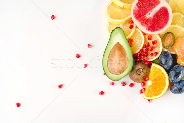 Friss lédús szeletel gyümölcsök izolált fehér Stock fotó © deandrobot