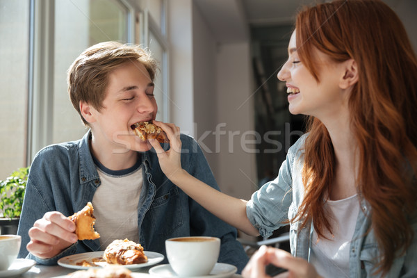 Fille étudiant copain souriant dessert séance [[stock_photo]] © deandrobot