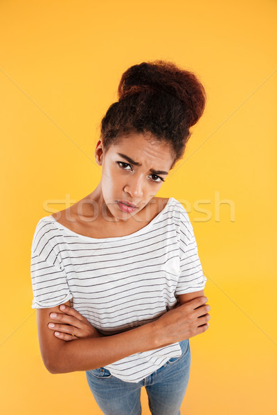 Puzzled displeased lady looking up at camera isolated Stock photo © deandrobot