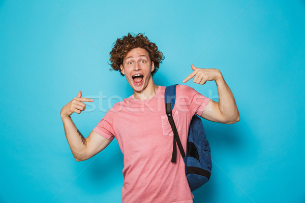 Portré európai diák fickó göndör haj visel Stock fotó © deandrobot